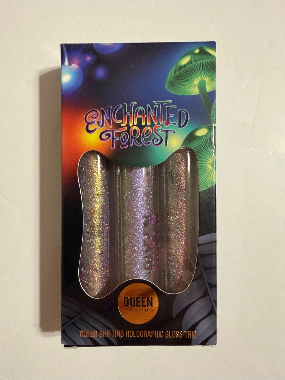 Queen Cosmetic Enchanted Forest Holographic Multicolor Lip Gloss Trio.